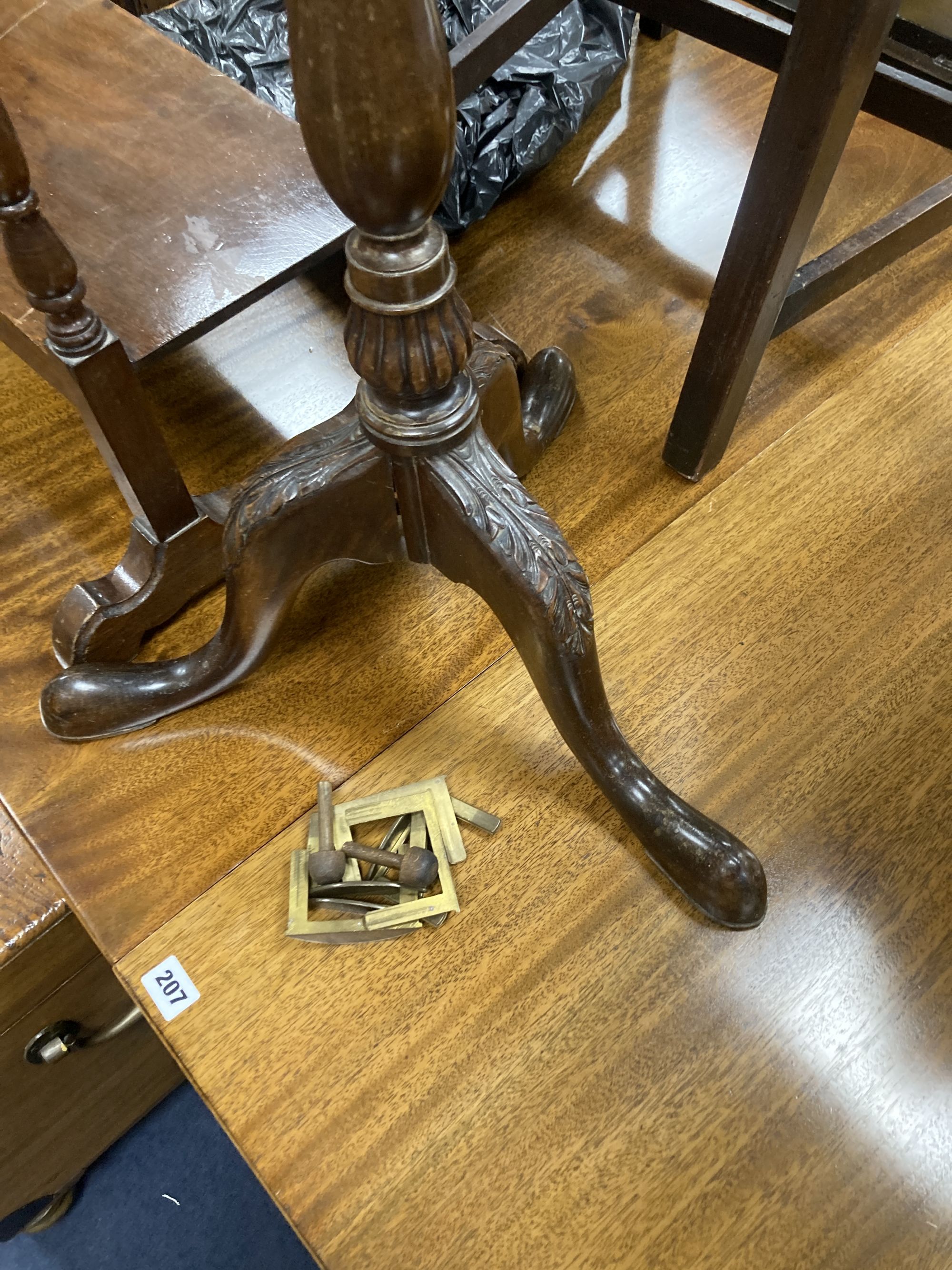 A 1920s mahogany tripod oil lamp standard, height 115cm and a two tier occasional table